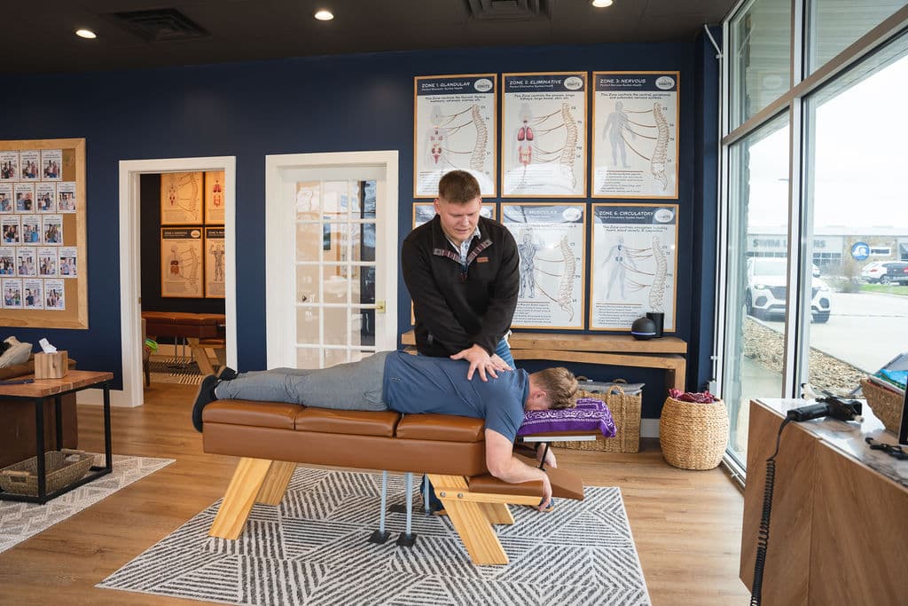 Ignite Chiropractic — full clinic view during chiropractic adjustment